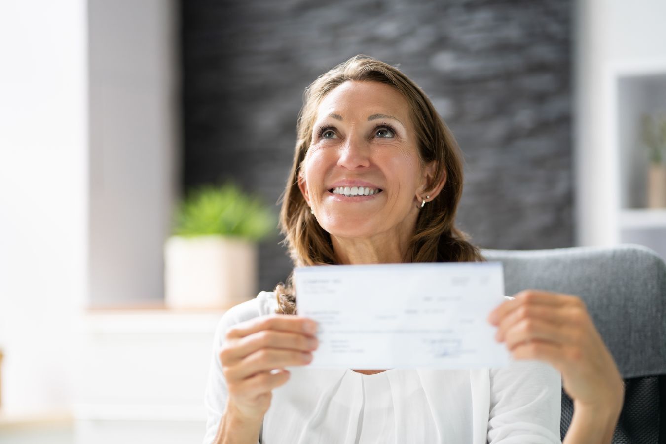 Woman with Cheque
